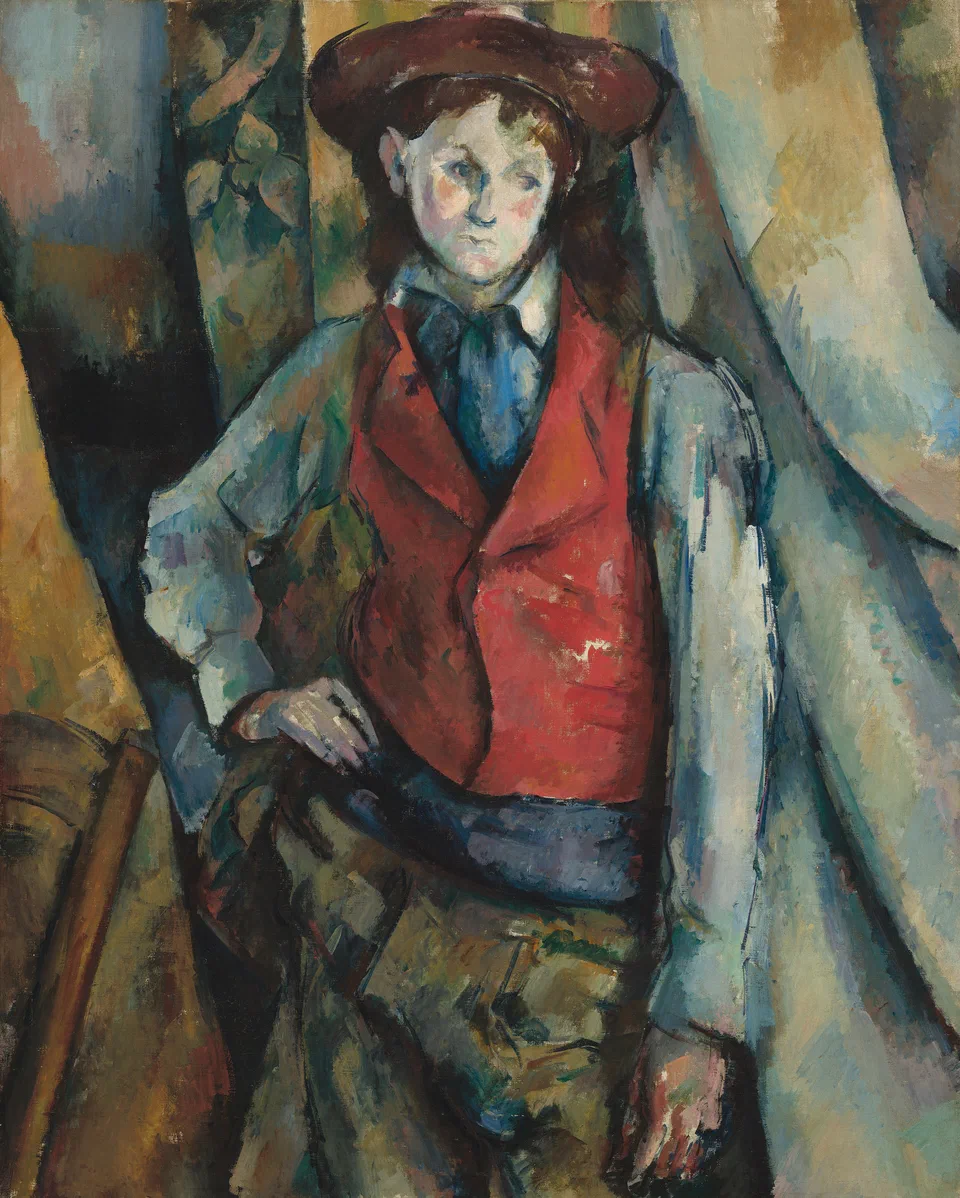 Garçon au gilet rouge