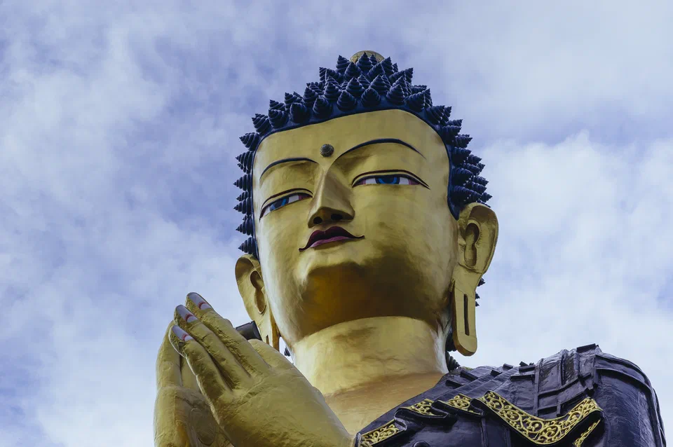 Closeup head shot of giant Gautama Buddha statue in Buddha Park of Ravangla, Sikkim